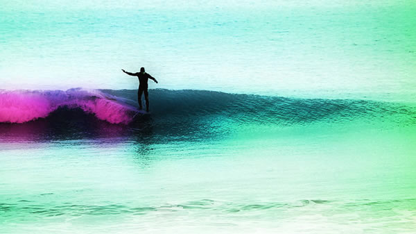 surfer on purple wave